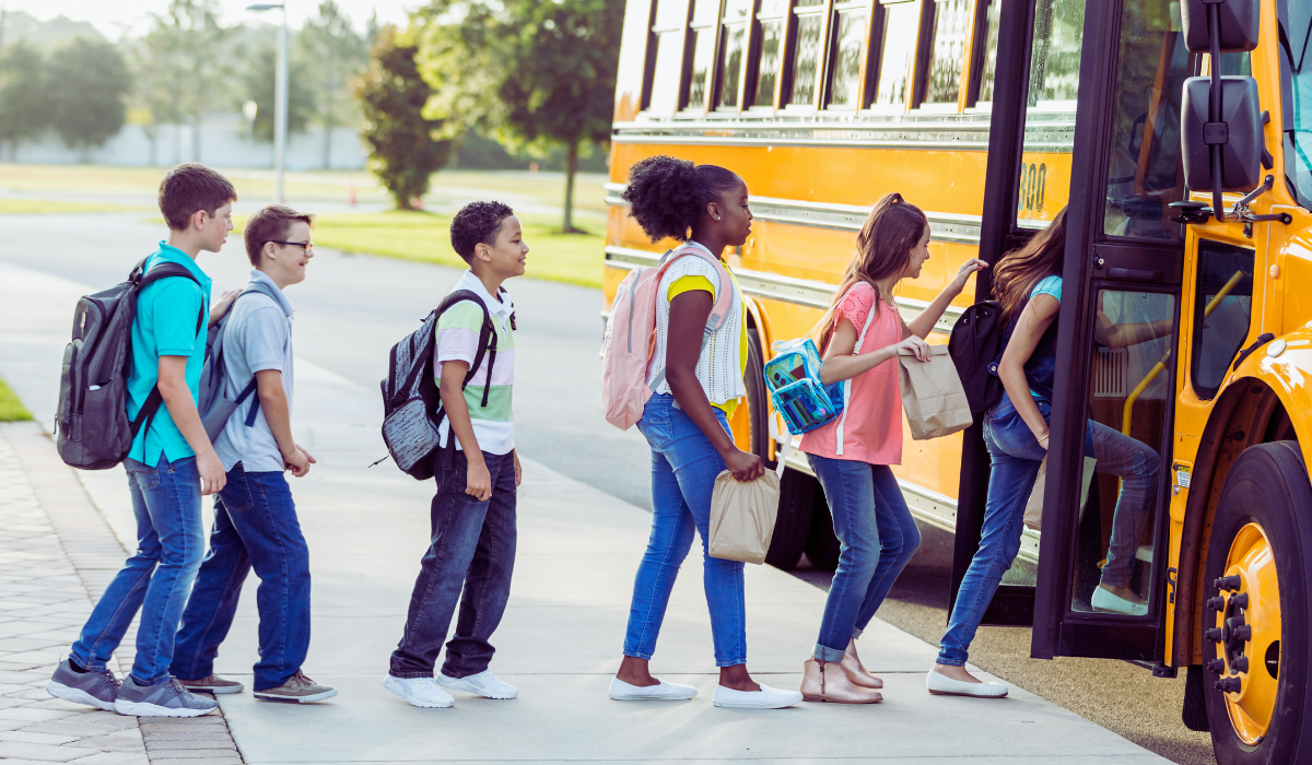 students boarding a bus